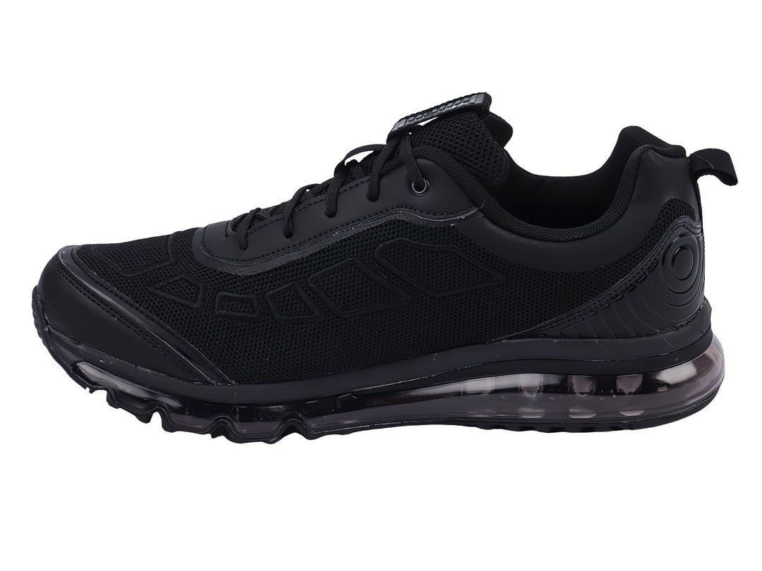 Tenis deportivos Karosso color negro total con suela amortiguada y detalles en malla.