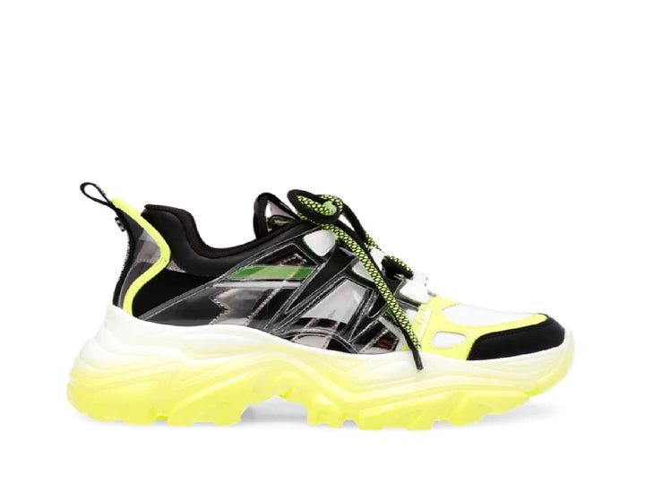 Tenis Steve Madden Riptide en colores negro, blanco y amarillo neón con suela gruesa y estilo deportivo.