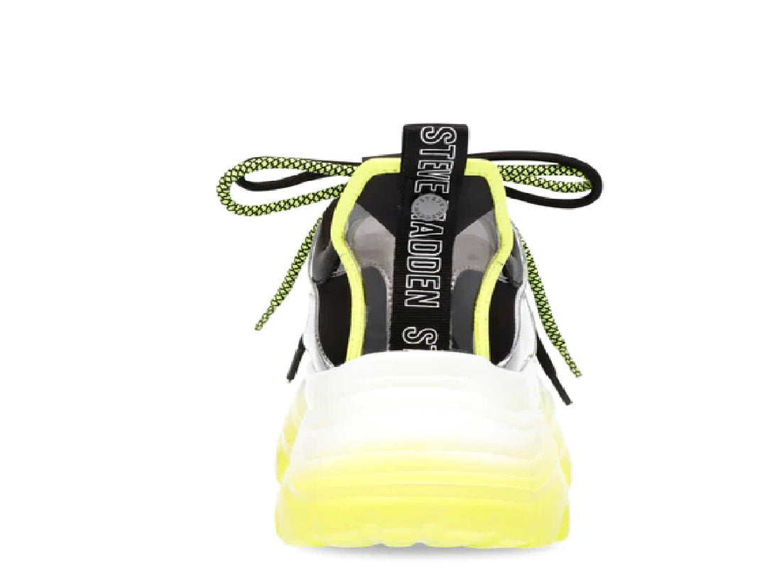 Tenis Steve Madden Riptide en colores negro, blanco y amarillo neón con suela gruesa y estilo deportivo.