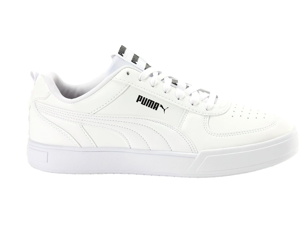 Tenis PUMA Caven Tape color blanco con suela blanca y detalles de marca en negro.