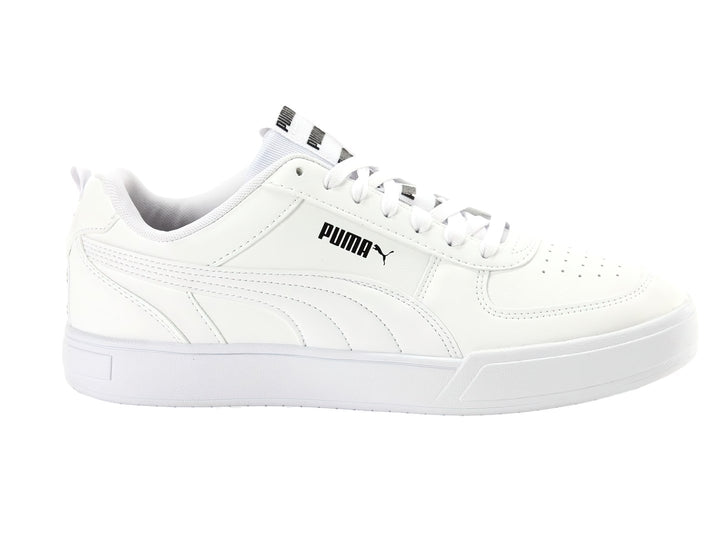 Tenis PUMA Caven Tape color blanco con suela blanca y detalles de marca en negro.