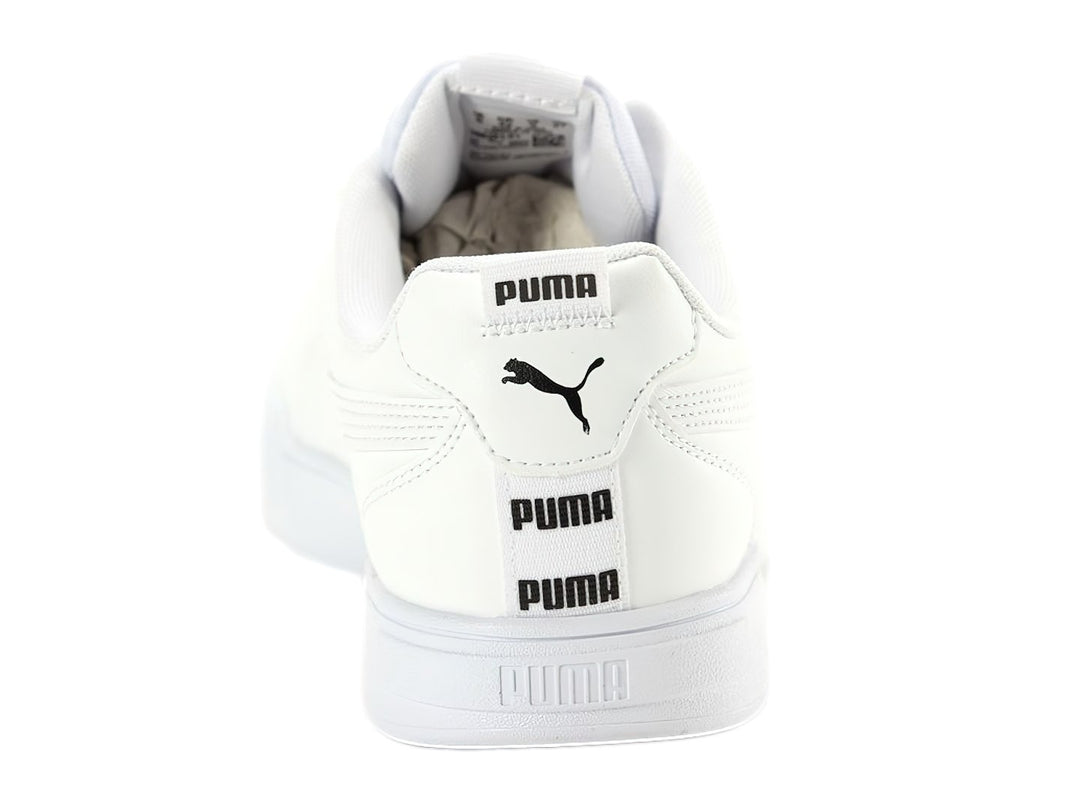 Tenis PUMA Caven Tape color blanco con suela blanca y detalles de marca en negro.