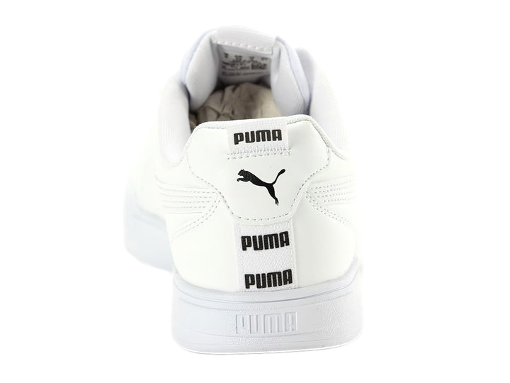 Tenis PUMA Caven Tape color blanco con suela blanca y detalles de marca en negro.