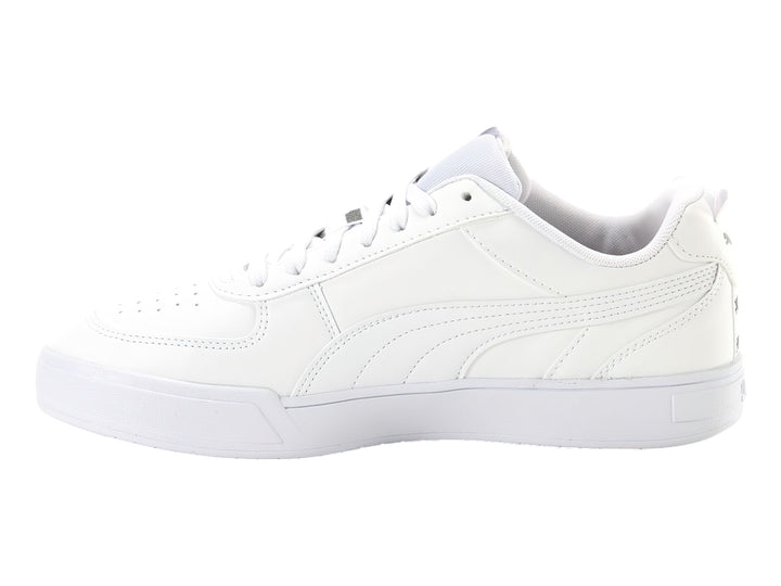 Tenis PUMA Caven Tape color blanco con suela blanca y detalles de marca en negro.