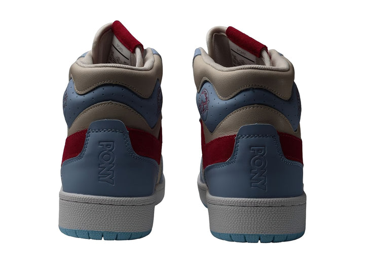 Tenis PONY City Wings Hi de cuero en colores azul claro, beige y rojo con suela blanca.