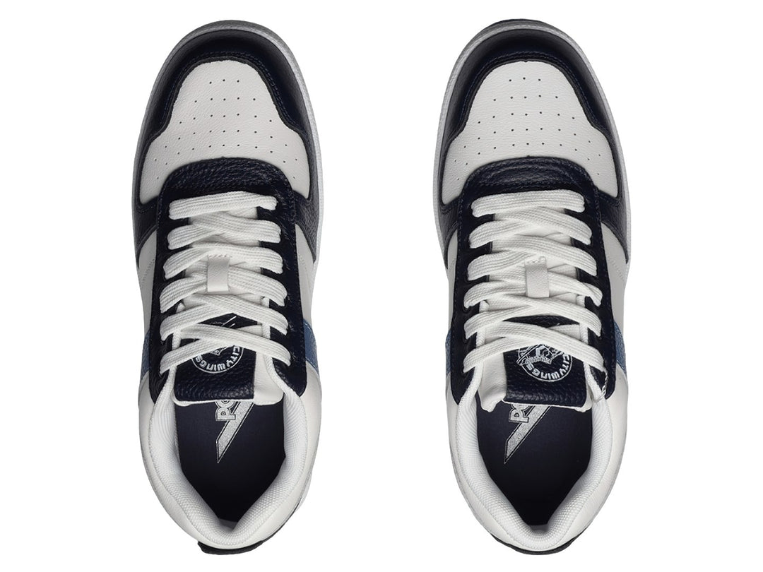 Tenis PONY City Wings en color blanco con detalles en azul marino y azul medio.