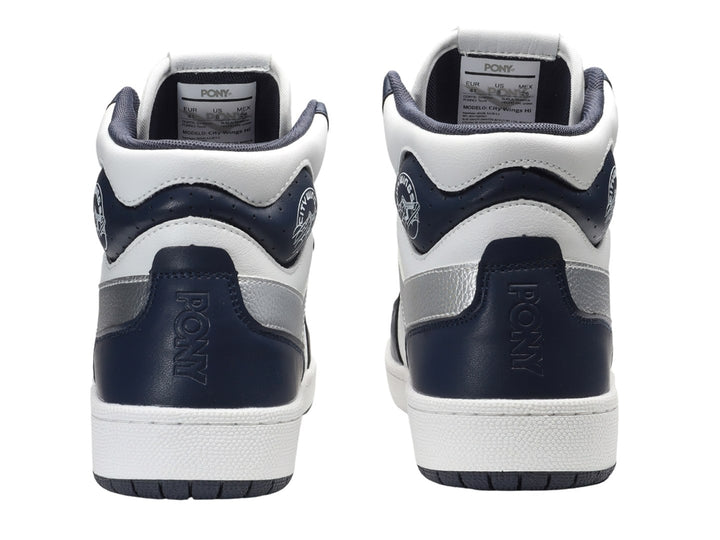 Tenis PONY City Wings Hi en colores blanco y azul marino con detalles plateados y suela blanca.