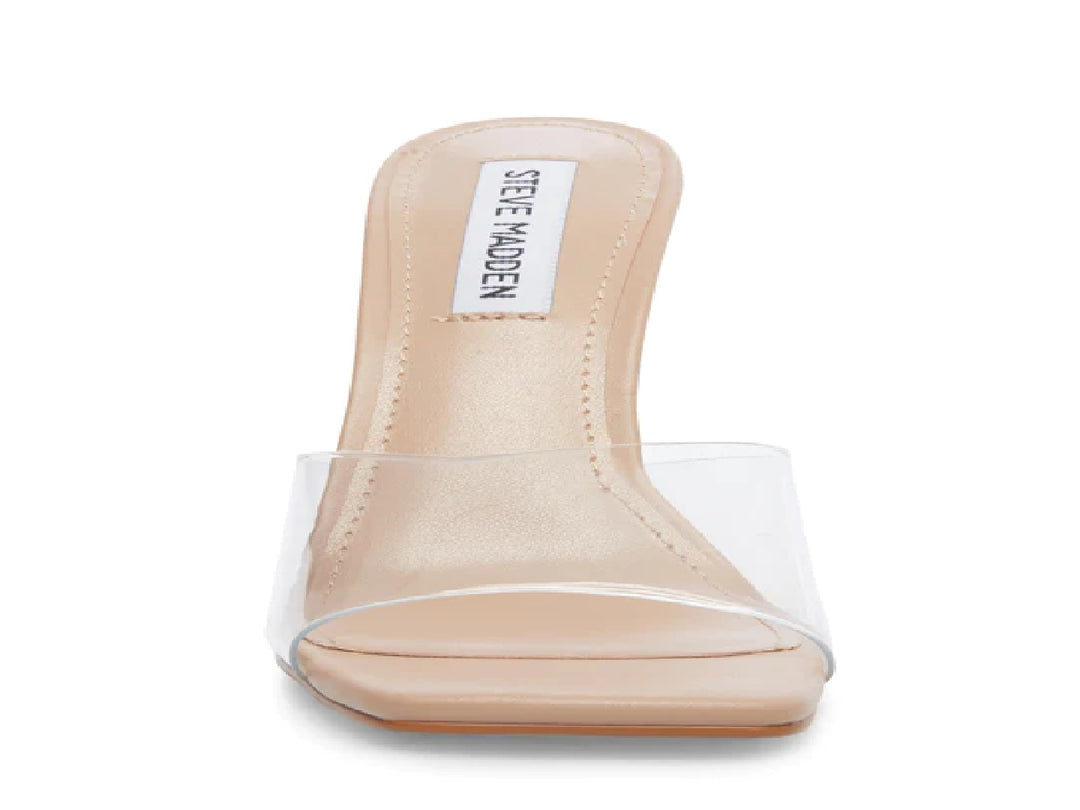 Sandalia de tacón alto Steve Madden con tira transparente y base color beige.