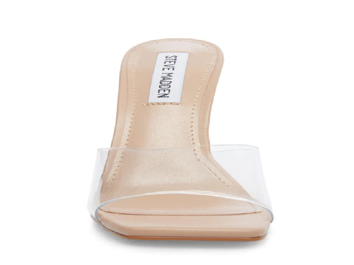 Sandalia de tacón alto Steve Madden con tira transparente y base color beige.