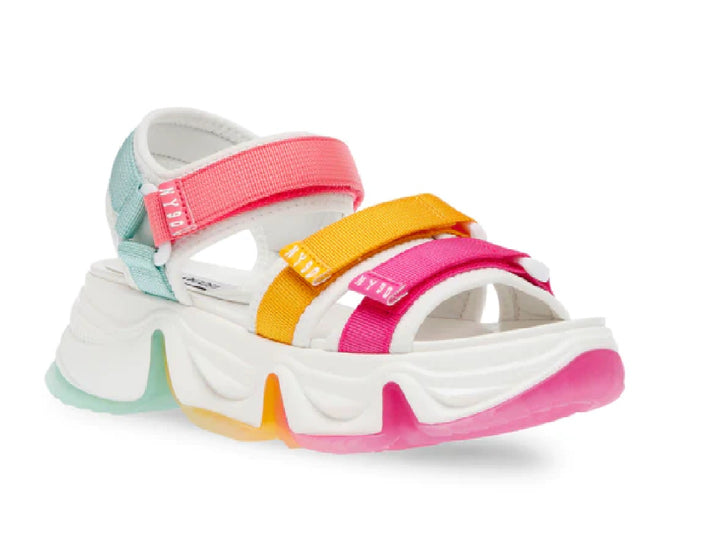 Sandalias Steve Madden blancas con correas multicolores en rosa, amarillo y azul con suela de plataforma gruesa.