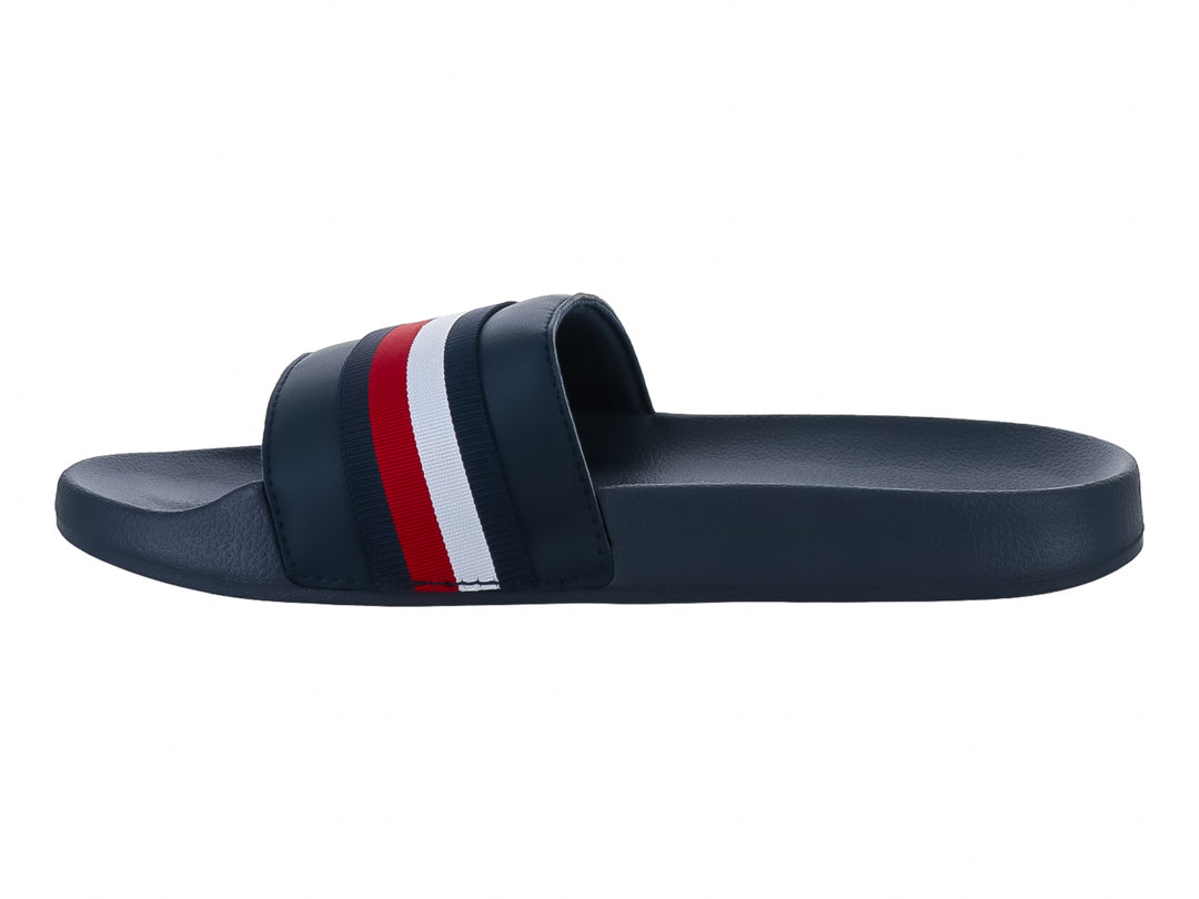 Sandalias Tommy Hilfiger azul marino con franjas blancas y rojas en la correa superior.