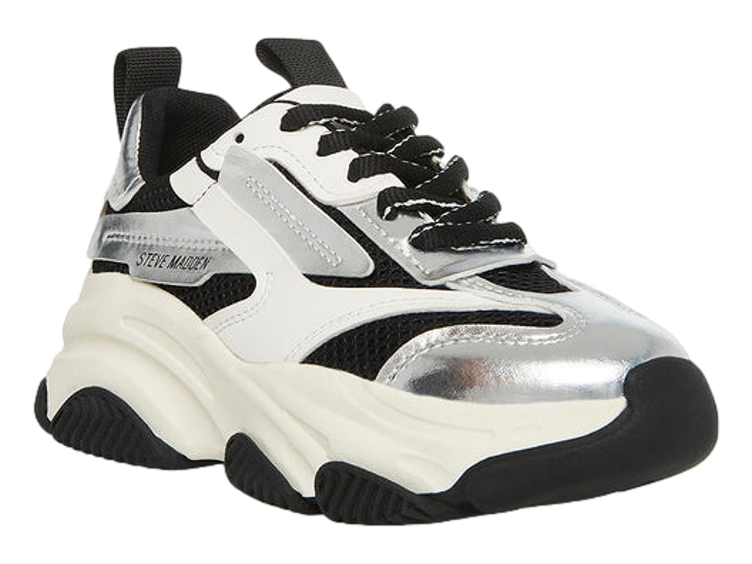 Tenis deportivos chunky para niños en colores blanco, negro y plateado metálico con suela ancha.