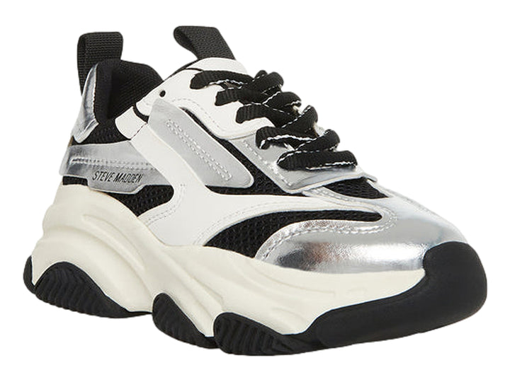 Tenis deportivos chunky para niños en colores blanco, negro y plateado metálico con suela ancha.