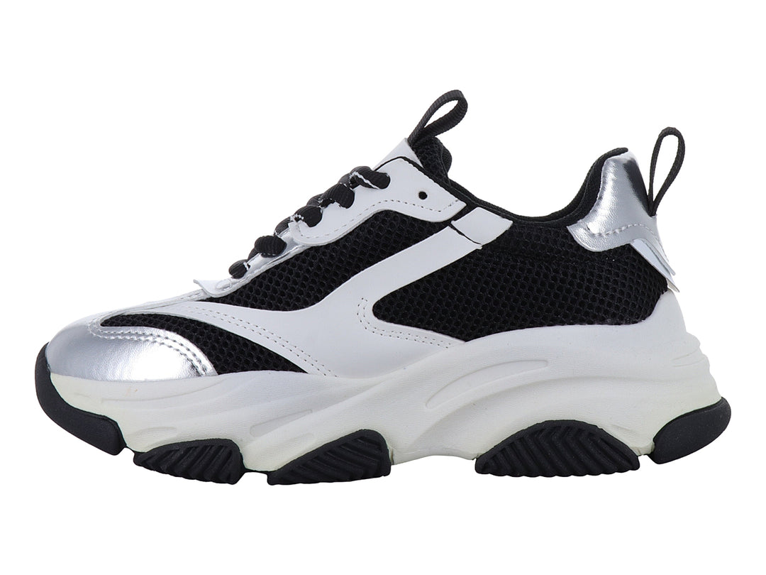 Tenis deportivos chunky para niños en colores blanco, negro y plateado metálico con suela ancha.