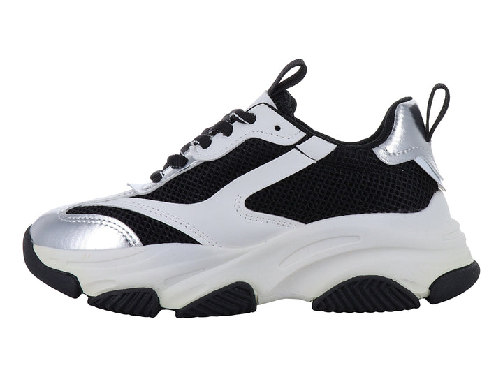 Tenis deportivos chunky para niños en colores blanco, negro y plateado metálico con suela ancha.