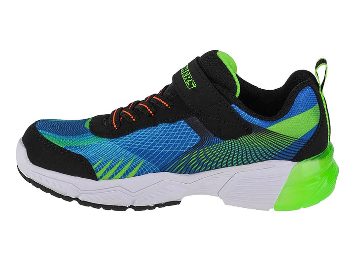 Tenis deportivos SKECHERS para niño en colores azul, verde neón y negro con cierre de velcro.
