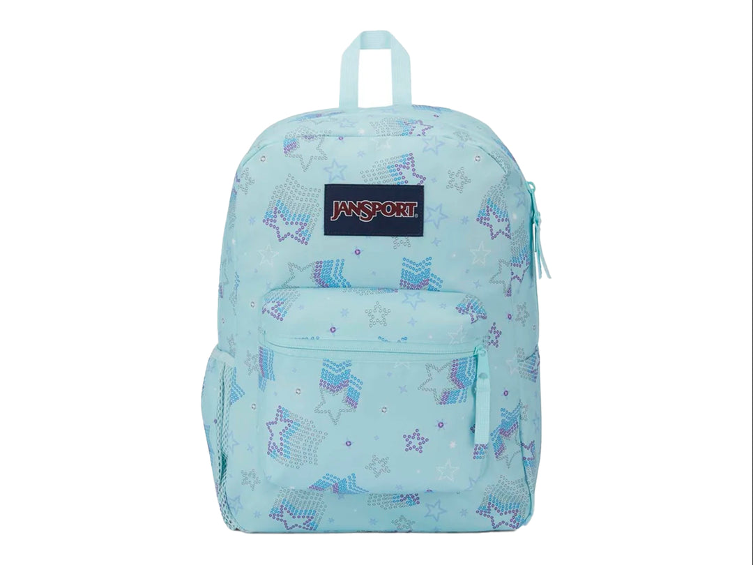 Mochila escolar JanSport azul claro con estampado de estrellas brillantes moradas.