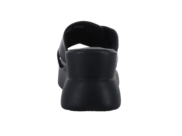Sandalia de plataforma color negro para mujer con tiras cruzadas y suela gruesa.