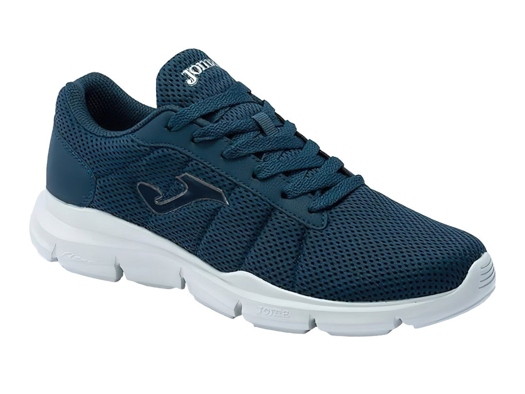 Tenis deportivos Joma color azul marino con suela blanca y tejido de malla.