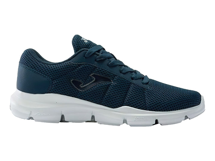 Tenis deportivos Joma color azul marino con suela blanca y tejido de malla.