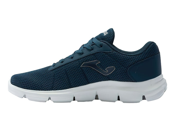 Tenis deportivos Joma color azul marino con suela blanca y tejido de malla.