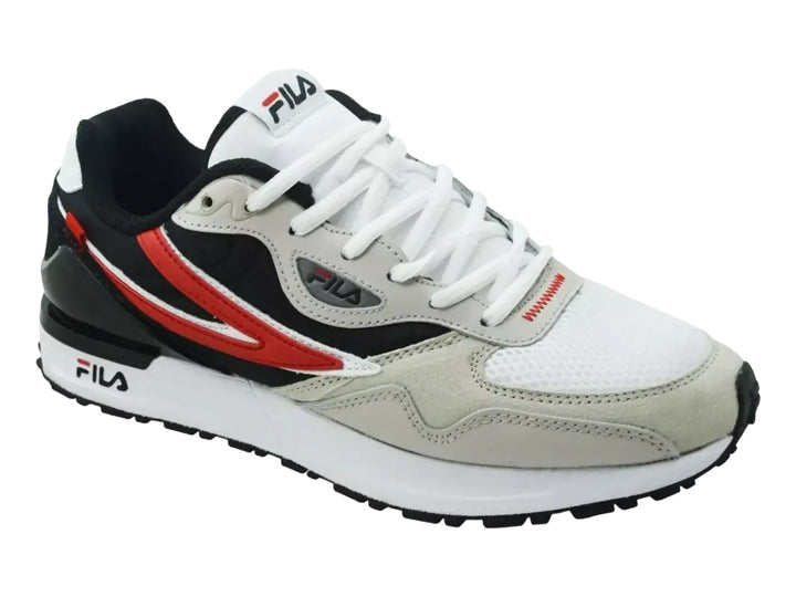 Tenis deportivos FILA en colores blanco y negro con una franja roja lateral y suela blanca.