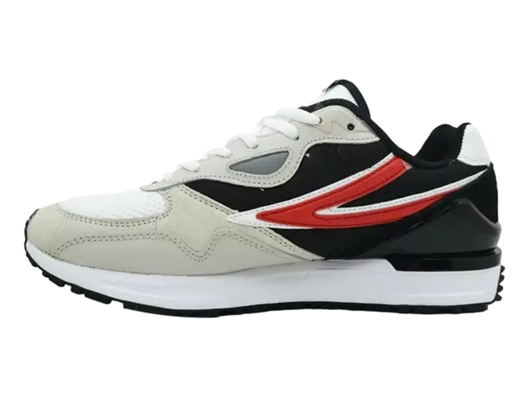 Tenis deportivos FILA en colores blanco y negro con una franja roja lateral y suela blanca.