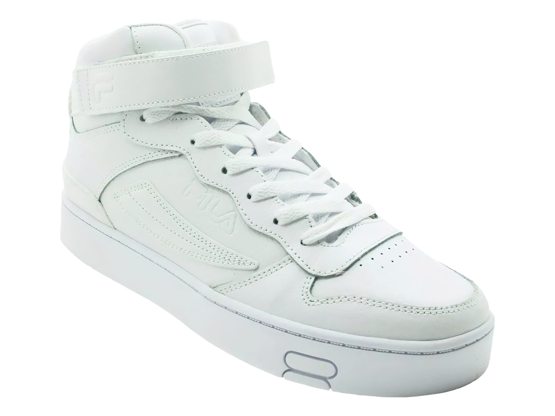 Tenis FILA MGX-100 Mid en color blanco total con correa de velcro y suela ancha.