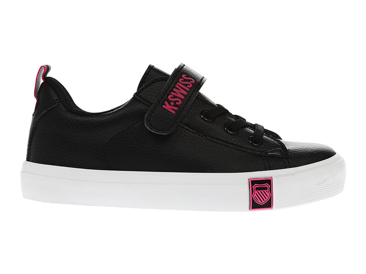 Tenis K-Swiss negros para niña con suela blanca, detalles en rosa y cierre de correa con velcro.