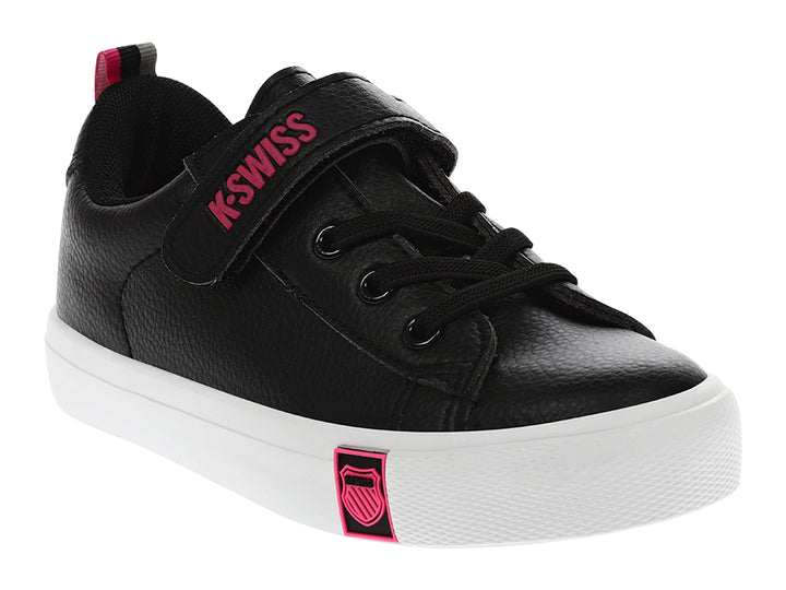 Tenis K-Swiss negros para niña con suela blanca, detalles en rosa y cierre de correa con velcro.