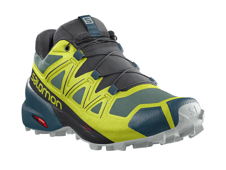 Zapato deportivo Salomon Speedcross 5 en colores verde amarillento y verde oscuro con suela rugosa.