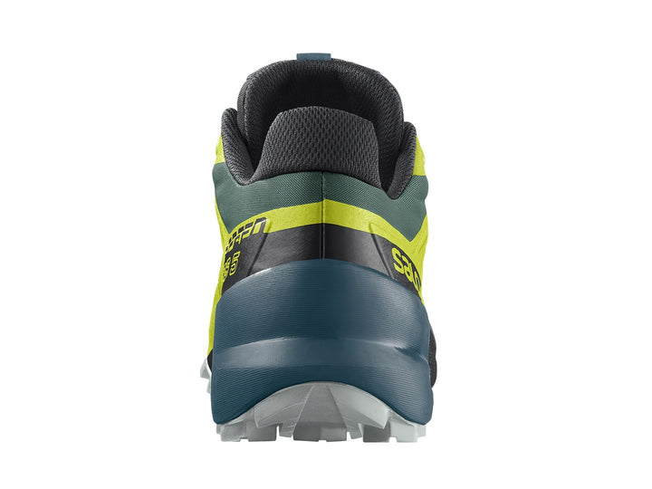 Zapato deportivo Salomon Speedcross 5 en colores verde amarillento y verde oscuro con suela rugosa.