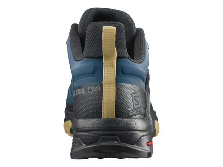 Botín de senderismo Salomon X Ultra 4 Mid GTX en color azul y negro con detalles en beige.