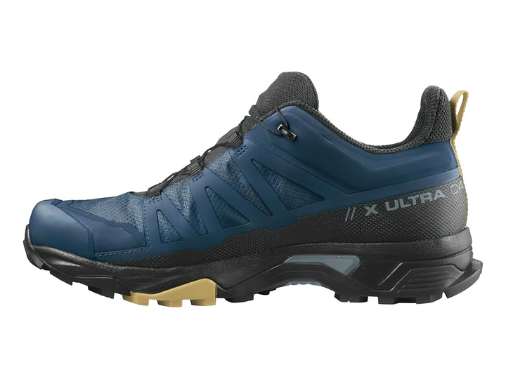 Botín de senderismo Salomon X Ultra 4 Mid GTX en color azul y negro con detalles en beige.