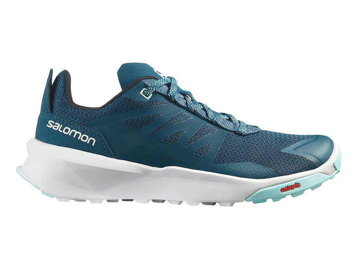 Zapato deportivo Salomon Patrol color azul con suela blanca y detalles en verde menta.