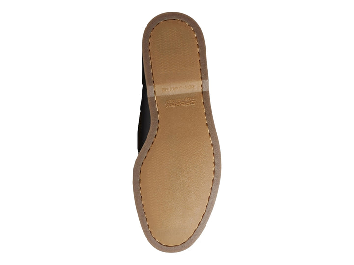 Zapato náutico Sperry color azul marino con detalles en gamuza y cordones cafés.