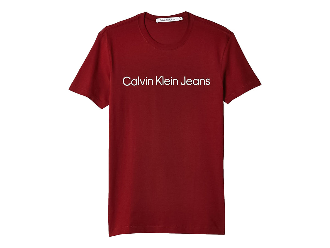 Camiseta Calvin Klein Jeans de color marrón con logotipo blanco en el pecho y corte slim.