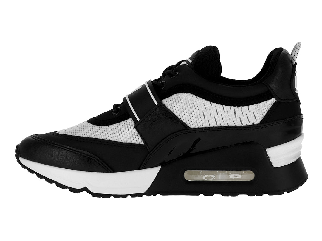 Tenis DKNY color blanco y negro con correa ajustable y suela con amortiguación.