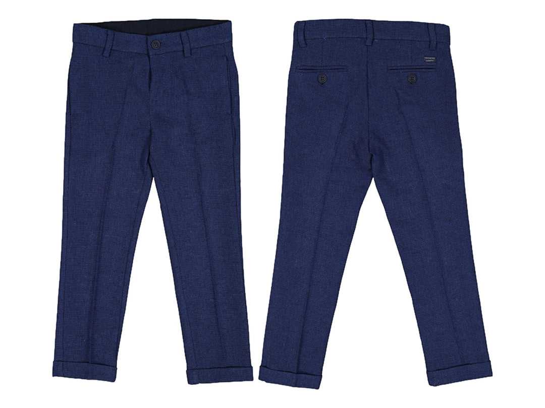 Pantalón de vestir para niño en color azul marino con corte recto y dobladillo inferior.