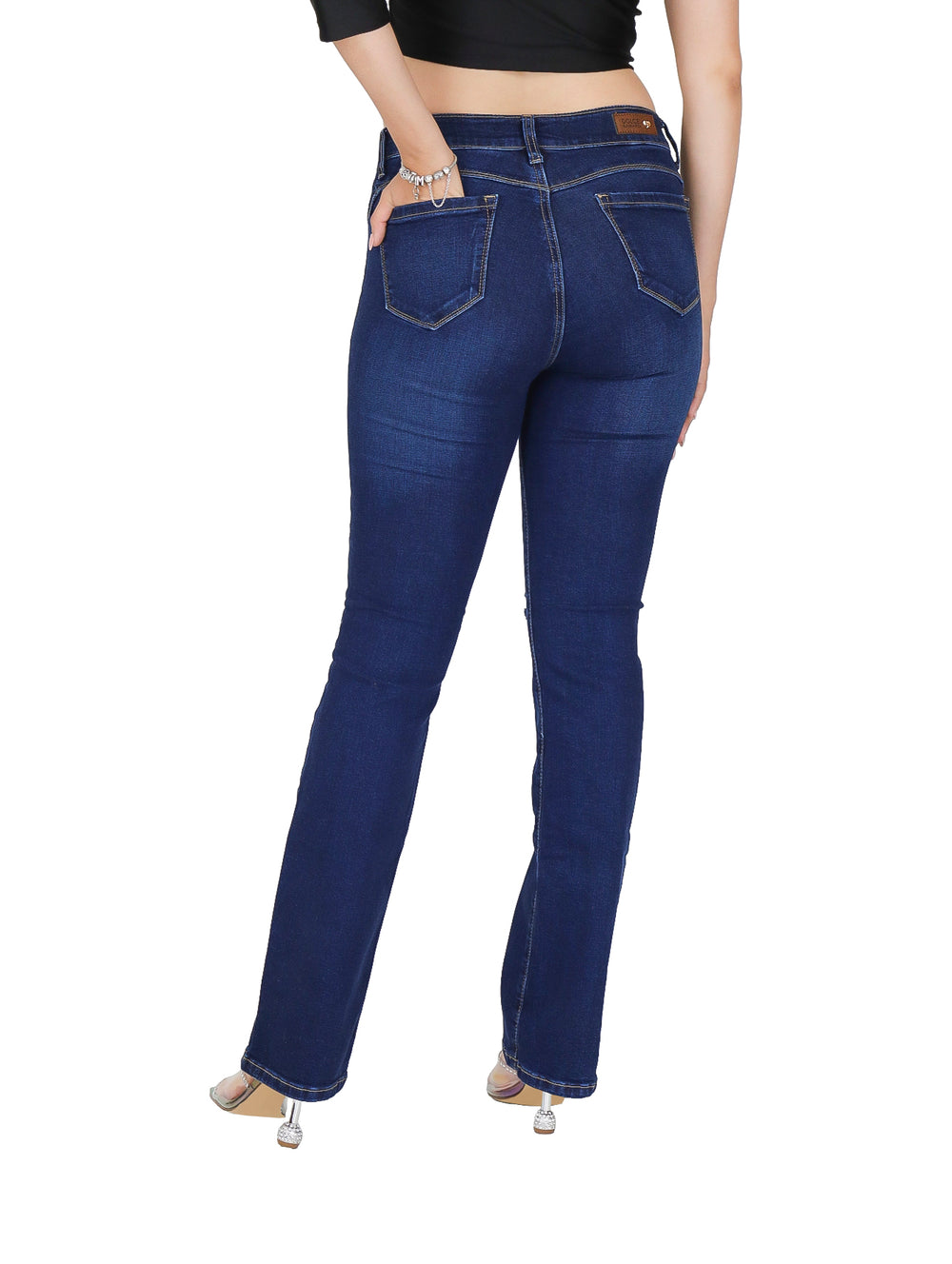 Jeans campana color azul oscuro con detalles de destrucción para mujer.