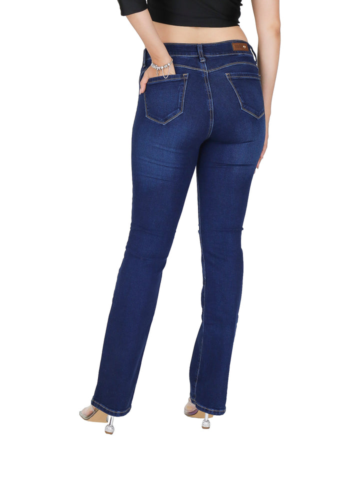 Jeans campana color azul oscuro con detalles de destrucción para mujer.