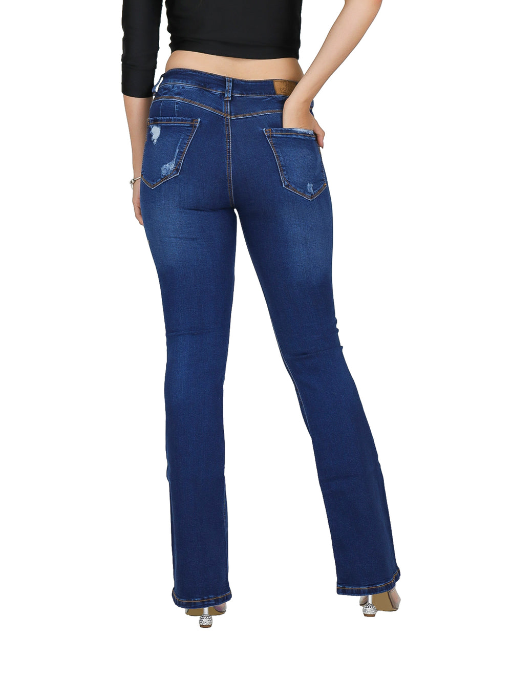 Pantalones jeans campana color azul oscuro con detalles de destrucción y desgaste para mujer.