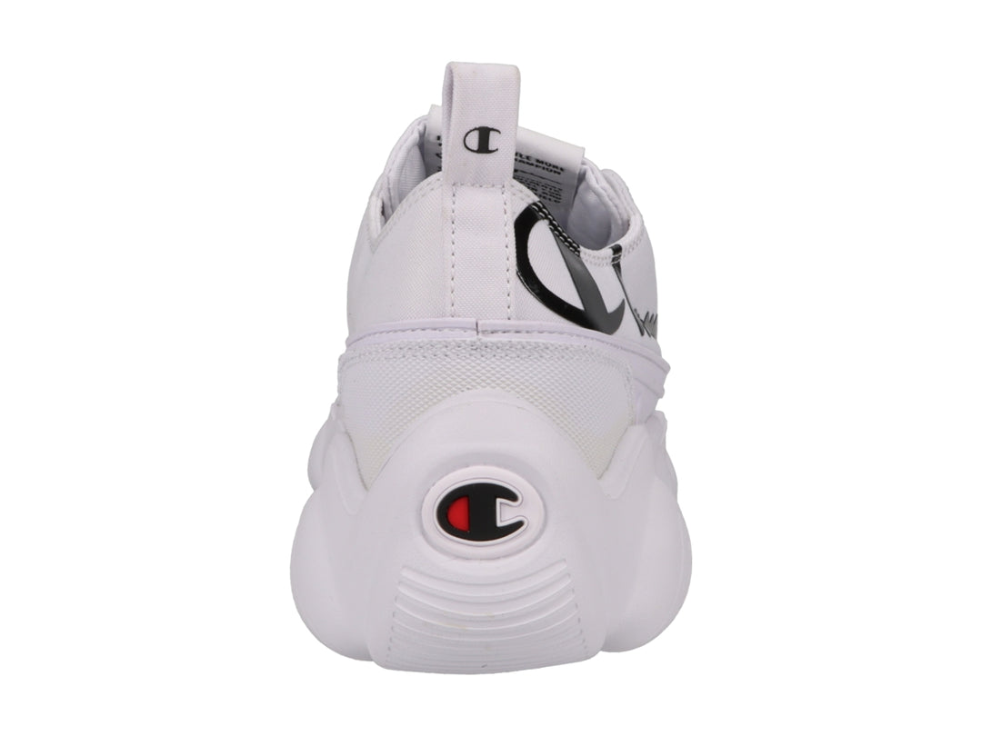Tenis Champion blancos de corte bajo con suela gruesa y logotipo negro en el lateral.