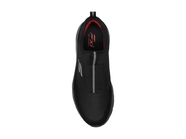 Zapato deportivo Flexi color negro, diseño sin cordones con suela amortiguada y tejido transpirable.