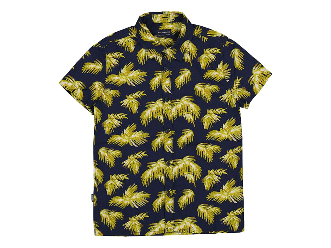 Camisa de manga corta azul marino con estampado de hojas tropicales amarillas para Niño.