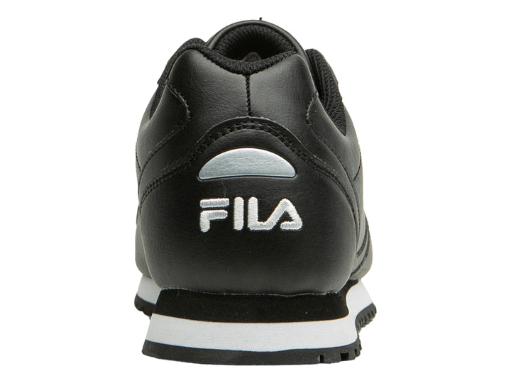 Tenis FILA Memento color negro con suela blanca y logotipo lateral blanco.
