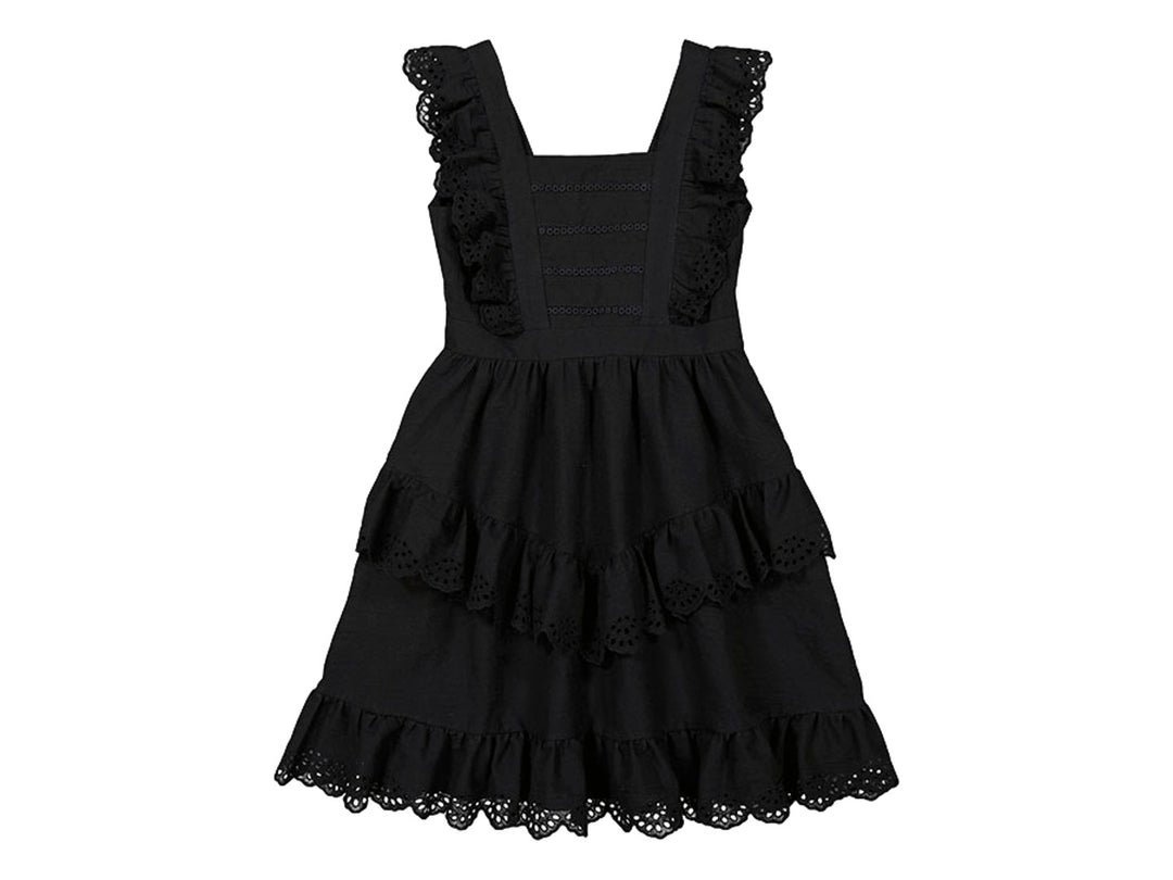 Vestido negro de popelín con volantes y detalles de encaje en los bordes.