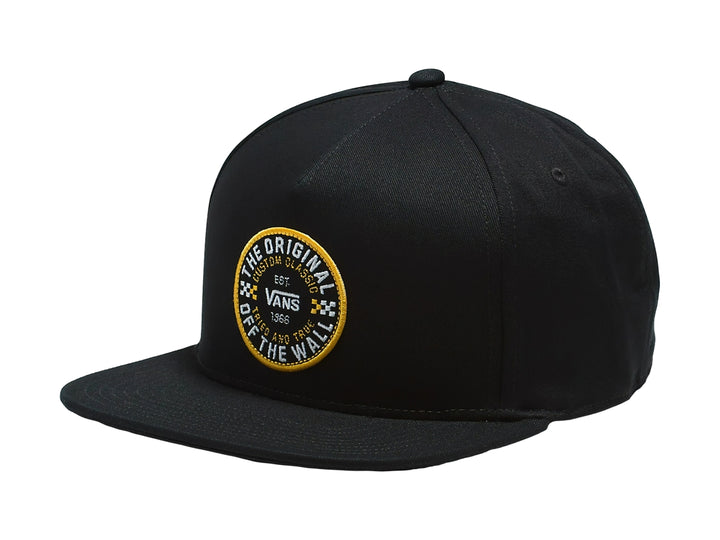 Gorra snapback negra de Vans con un logo circular amarillo y blanco en la parte frontal.