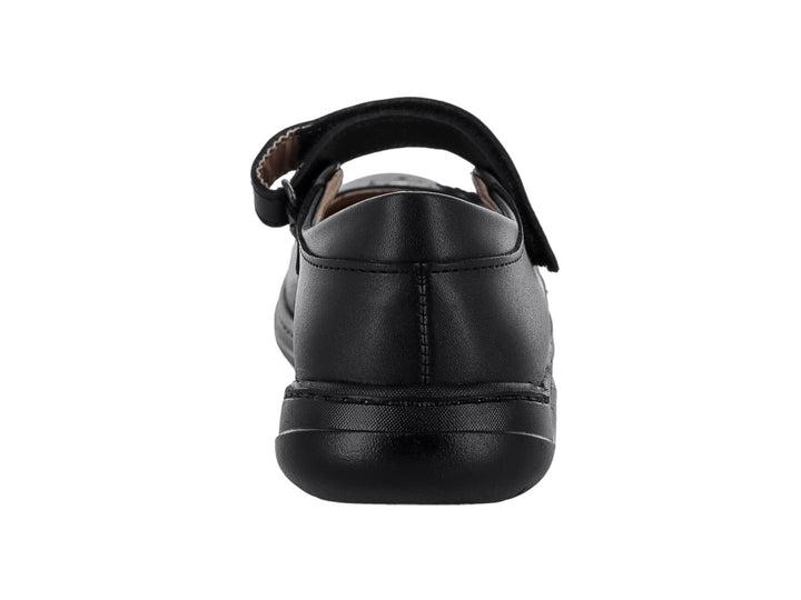 Zapato negro para niña estilo Mary Jane con adornos de flores en la punta.