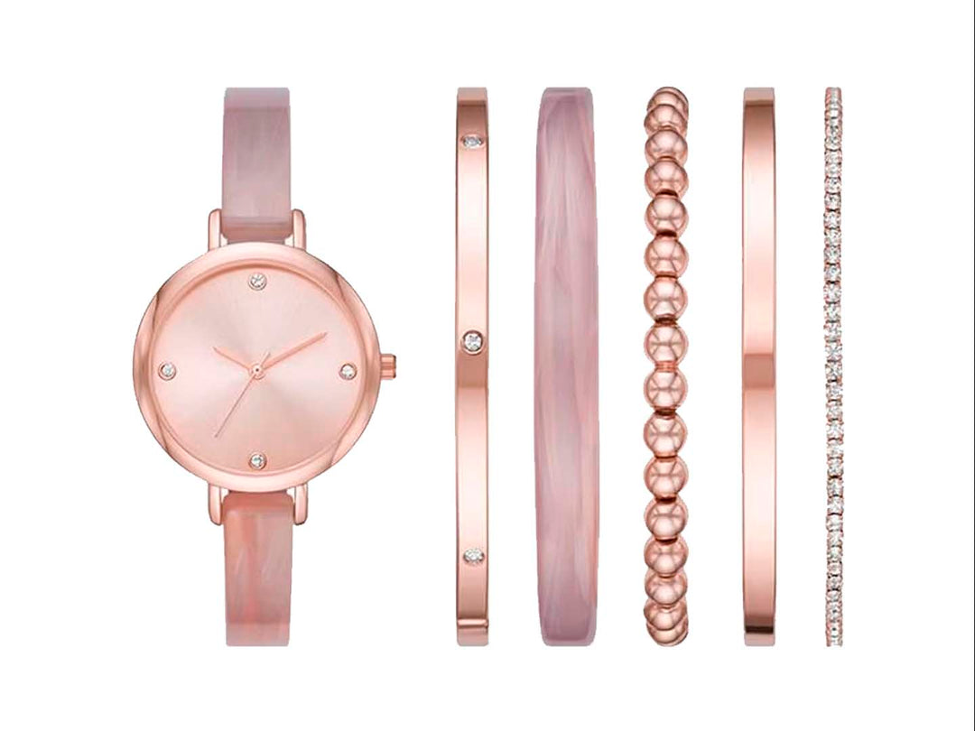 Set de 6 piezas Folio en color oro rosa que incluye un reloj circular y cinco pulseras coordinadas.